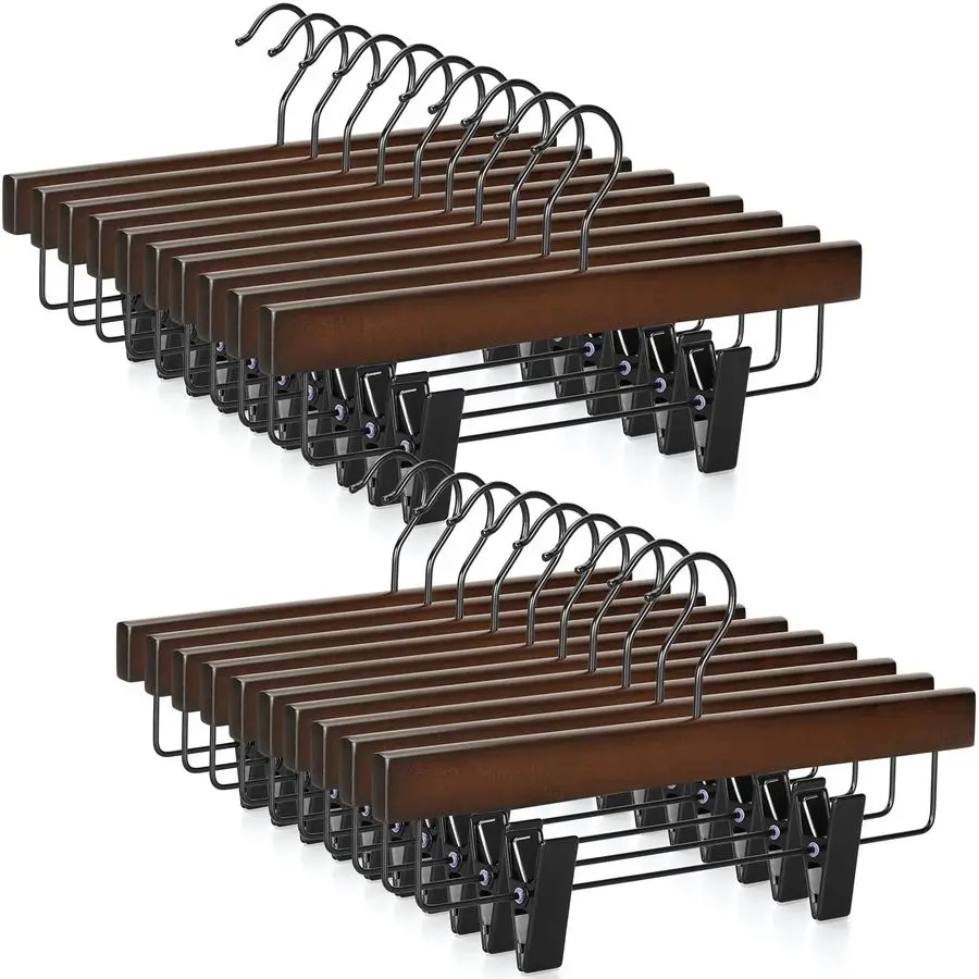 Деревянные вешалки для брюк и юбок с 2 регулируемыми металлическими зажимами, премиум-класса, в ретро-стиле, с черным крючком, вращающимся на 360°.
Деревянные вешалки для брюк и юбок с 2 регулируемыми металлическими зажимами, премиум-класса, в ретро-стиле, с черным крючком, вращающимся на 360°.