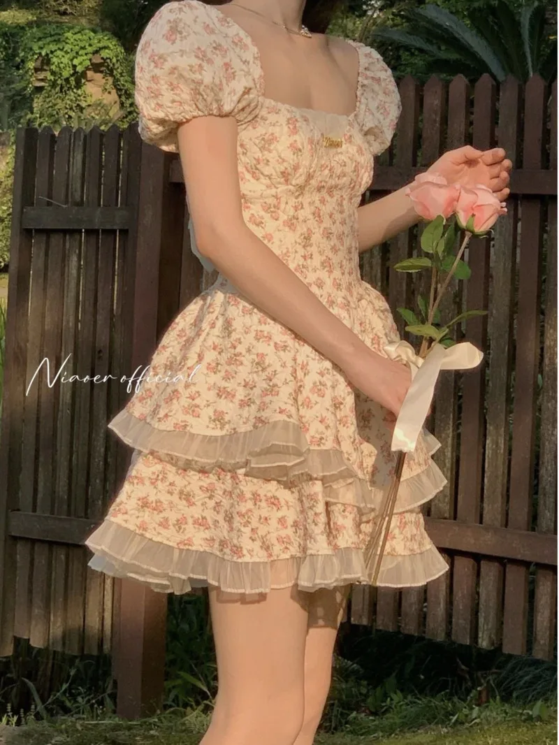 French Fashion Sweet Boat Neck Fragmented Flower Bubble Sleeve Dress Summer New Open Back Hollow Bow Slim Fit Design Skirt OUC5
French Fashion Sweet Boat Neck Fragmented Flower Bubble Sleeve Dress Summer New Open Back Hollow Bow Slim Fit Design Skirt OUC5
