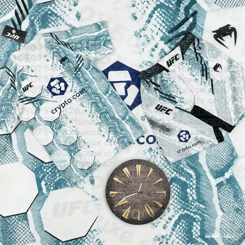 Новый летний комплект для единоборств UFC 2026: дышащий, быстросохнущий спортивный костюм оверсайз для мужчин и женщин (бокс, ММА, джиу-джитсу)
Новый летний комплект для единоборств UFC 2026: дышащий, быстросохнущий спортивный костюм оверсайз для мужчин и женщин (бокс, ММА, джиу-джитсу)