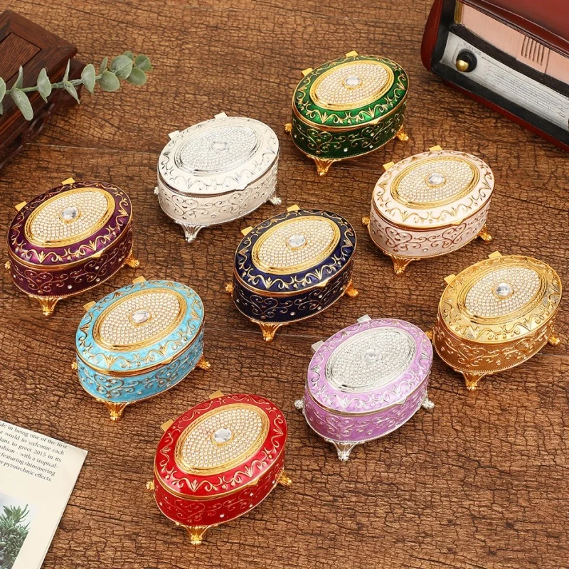 European Style Mini Jewelry Storage Box Organizer Portable Ellipsoid Inlaid Gem Alloy Necklace Ring Storage Dresser Display Case
European Style Mini Jewelry Storage Box Organizer Portable Ellipsoid Inlaid Gem Alloy Necklace Ring Storage Dresser Display Case