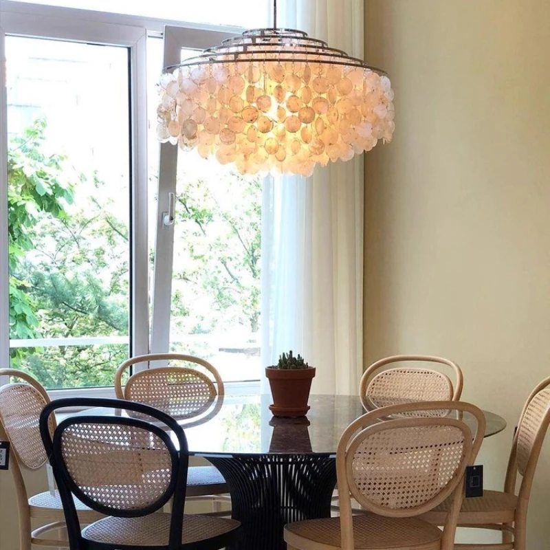 Pearl shell chandelier retro wind chimes dining room chandelier light luxury villa living room study bedroom light
Pearl shell chandelier retro wind chimes dining room chandelier light luxury villa living room study bedroom light