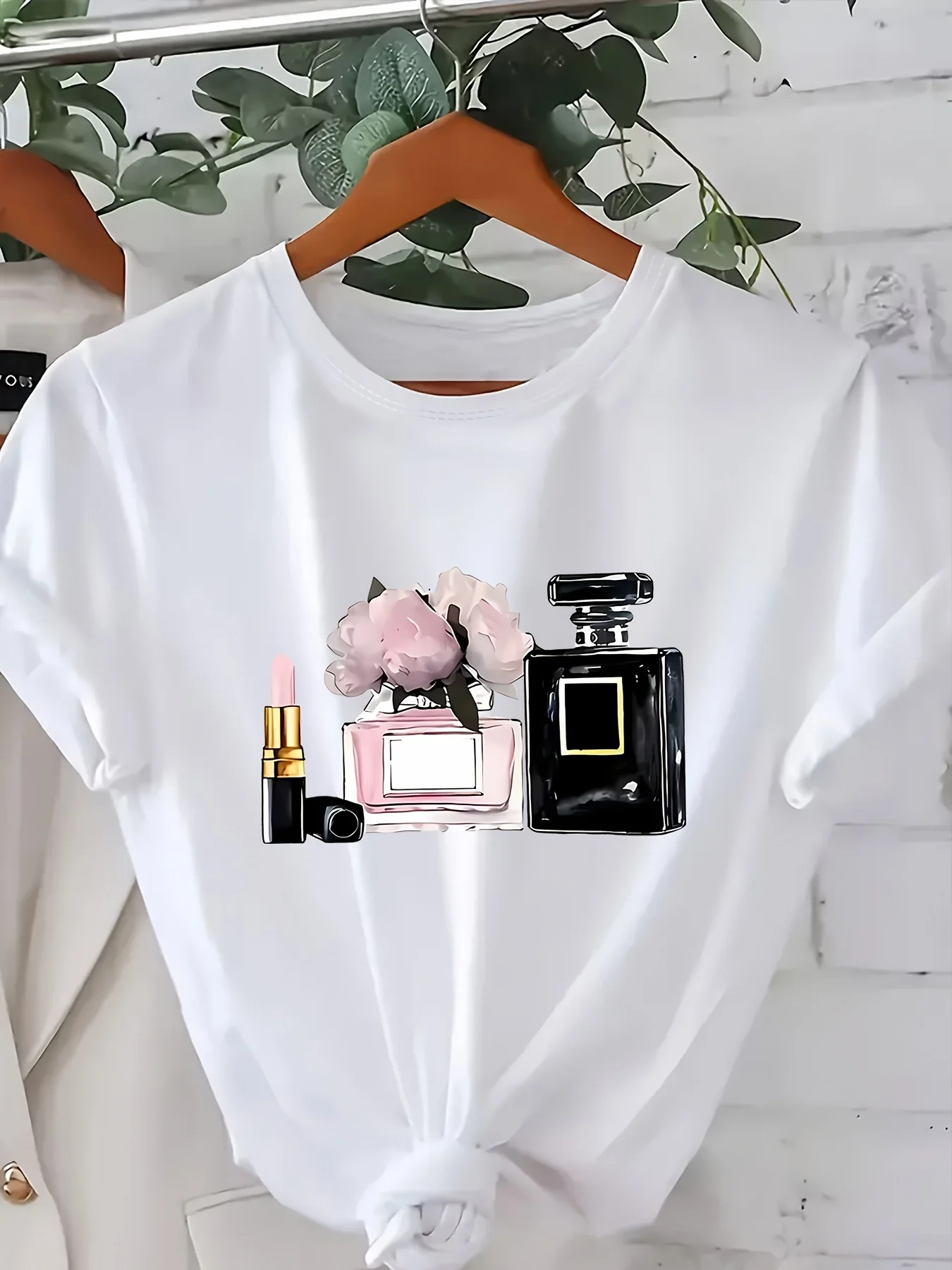 Women's Parisian Perfume & Lipstick Graphic T-Shirt - Vibrant Short Sleeve Crew Neck Casual Top Perfect for Spring/Summer/Fall 
Women's Parisian Perfume & Lipstick Graphic T-Shirt - Vibrant Short Sleeve Crew Neck Casual Top Perfect for Spring/Summer/Fall