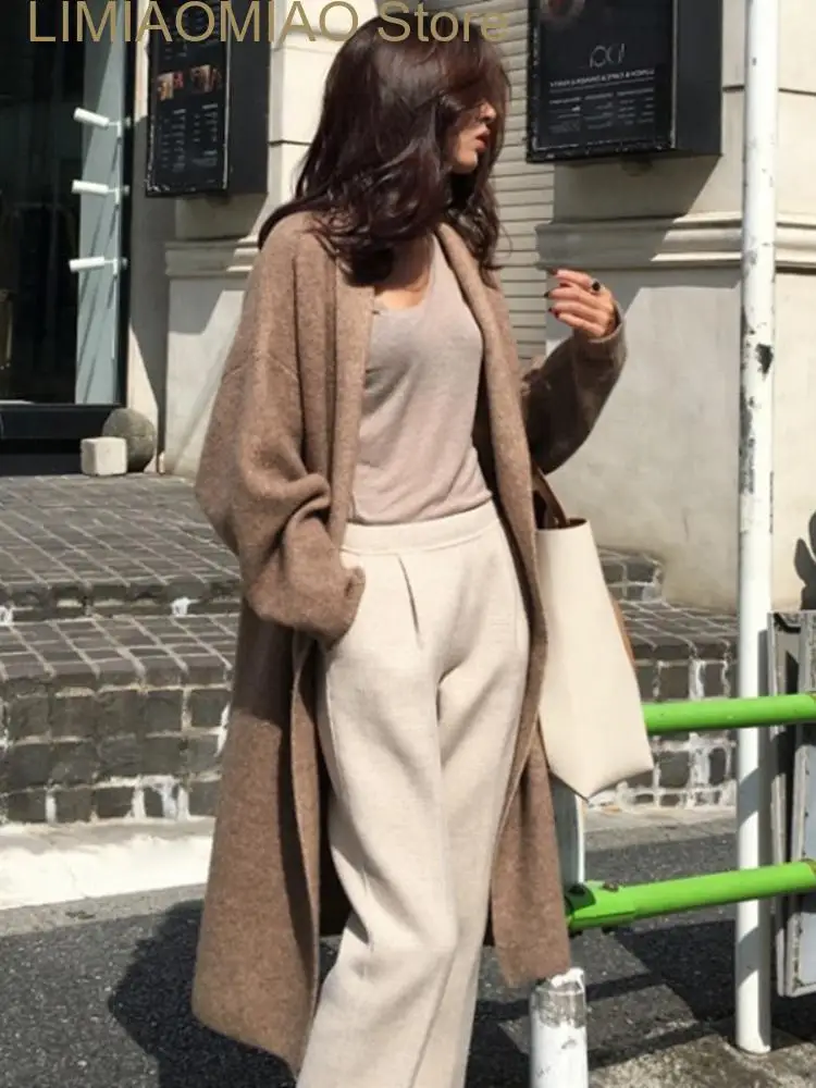 New Autumn Winter Fashion Women's Sweater Loose Cardigan Medium Long Sweater Jacket Women Cardigan Oversized Cardigan Sweater
New Autumn Winter Fashion Women's Sweater Loose Cardigan Medium Long Sweater Jacket Women Cardigan Oversized Cardigan Sweater
