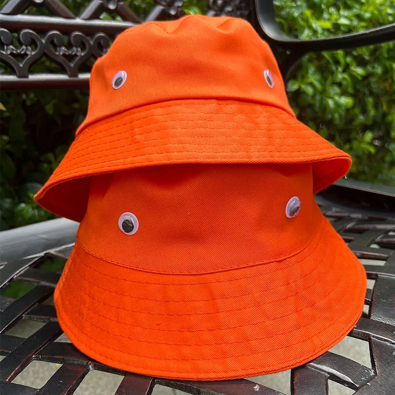 Funny Cartoon Novelty Inspired Sassy Orange Bucket Hat With Eyes Design Unisex Sun Protection Fisherman Hat For Streetwear Party
Funny Cartoon Novelty Inspired Sassy Orange Bucket Hat With Eyes Design Unisex Sun Protection Fisherman Hat For Streetwear Party