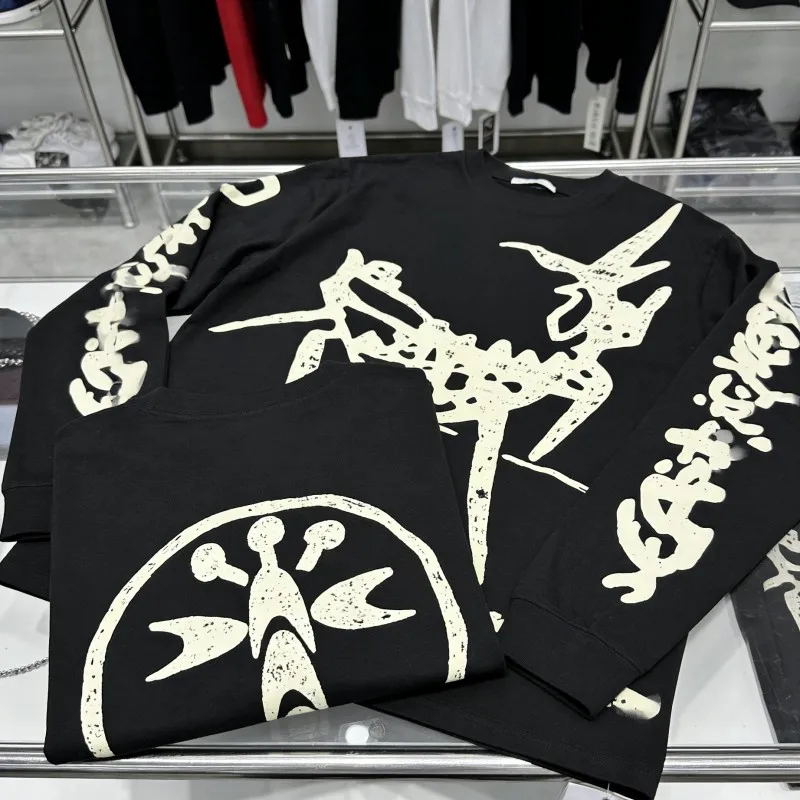 Men Women Hiphop Streetwear Cactus Jack Long Sleeve Tshirts Vintage Distressed Fade Crack Print Utopia Tops Casual Black Outfit
Men Women Hiphop Streetwear Cactus Jack Long Sleeve Tshirts Vintage Distressed Fade Crack Print Utopia Tops Casual Black Outfit