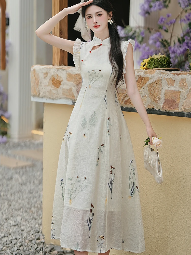 Women Fashion Emboridery Floral Long Dress Summer Flying Sleeve Stand Collar Cheongsam Dress 2026 Korean Vintage Luxury Vestidos
Women Fashion Emboridery Floral Long Dress Summer Flying Sleeve Stand Collar Cheongsam Dress 2026 Korean Vintage Luxury Vestidos