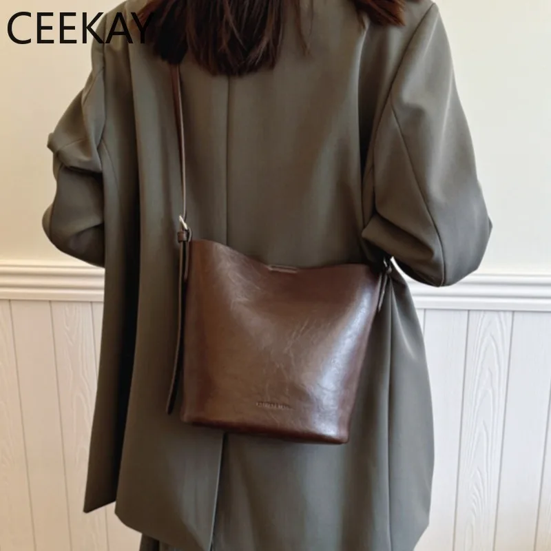 CEEKAY Vintage Brown Leather Bucket Bag, Small Crossbody Bag with Adjustable Strap, Trendy Handbag for Commute handbag
CEEKAY Vintage Brown Leather Bucket Bag, Small Crossbody Bag with Adjustable Strap, Trendy Handbag for Commute handbag