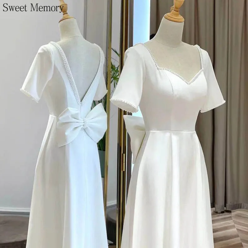 N148 Women Vintage Wedding Dresses Tea-Length Short Sleeves Bride Simple White Party Dress Backless Formal Gown With Pearls Bow
N148 Women Vintage Wedding Dresses Tea-Length Short Sleeves Bride Simple White Party Dress Backless Formal Gown With Pearls Bow