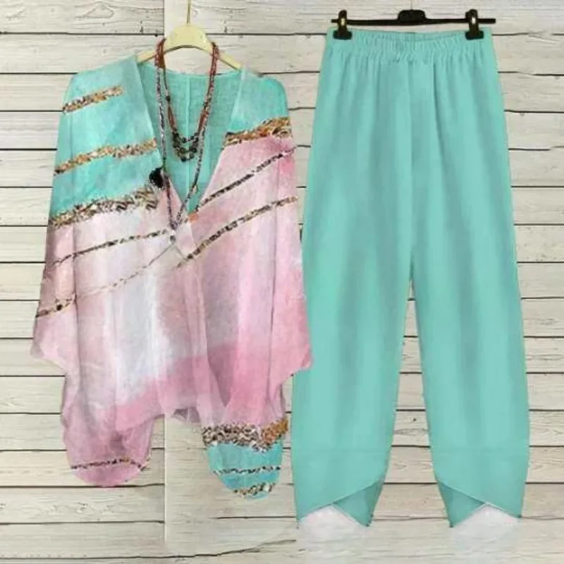 New Spring Floral Print Two Piece Sets Womens Outfits Sexy V-neck 3/4 Sleeve Top Pullover Elastic Waist Pants Summer Loose Suit
New Spring Floral Print Two Piece Sets Womens Outfits Sexy V-neck 3/4 Sleeve Top Pullover Elastic Waist Pants Summer Loose Suit