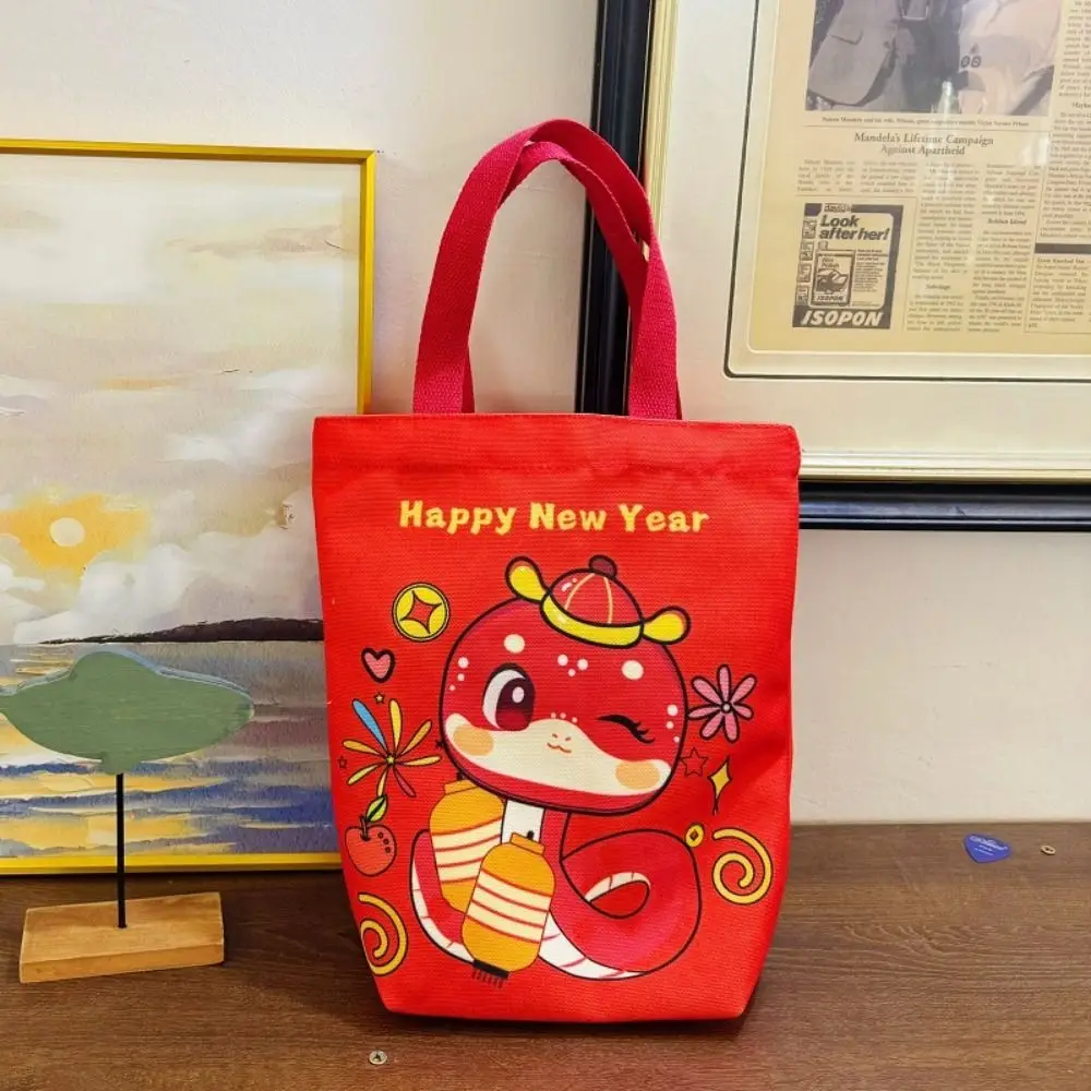 Fashion Cartoon Snake Year Canvas Bag Year of The Snake 2025 Happy New Year Handbag New Year Gift Purse Red Tote Bag Girl
Fashion Cartoon Snake Year Canvas Bag Year of The Snake 2025 Happy New Year Handbag New Year Gift Purse Red Tote Bag Girl