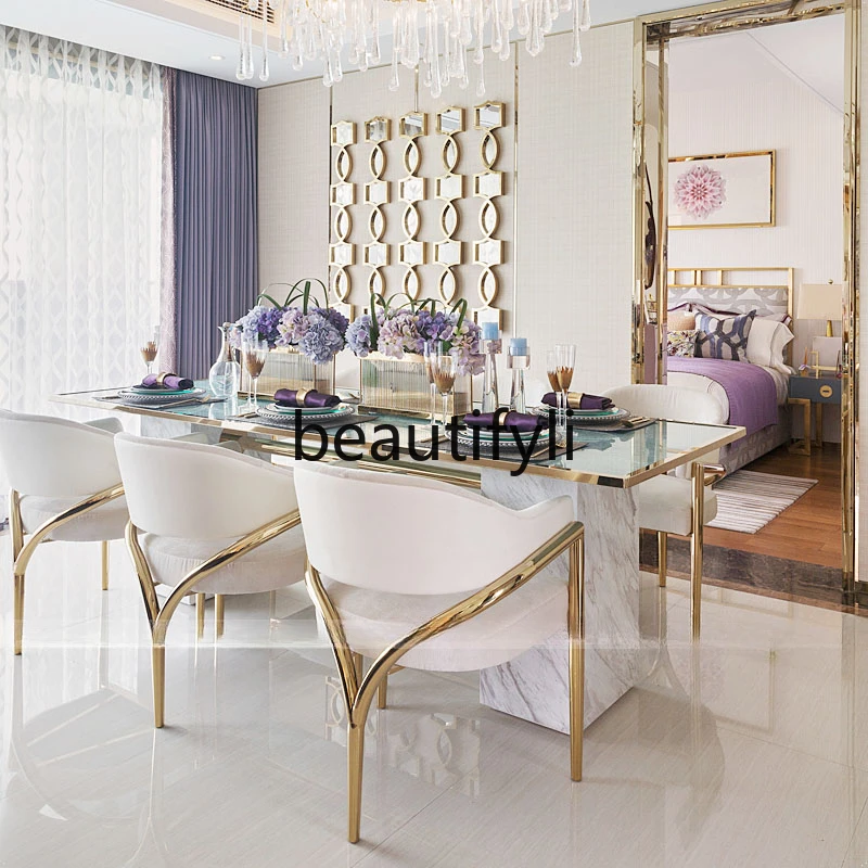 Light luxury glass dining table and chairs 2024 new modern marble dining table for six people 
Light luxury glass dining table and chairs 2024 new modern marble dining table for six people