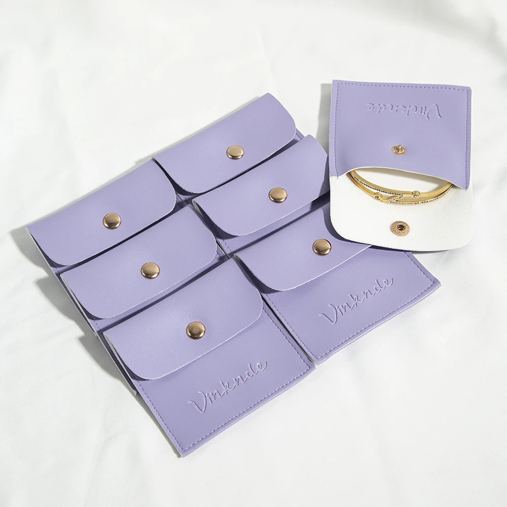 Pack of 50PCS PU Leather Jewelry Bags with Snap Button for Necklaces Bracelet Rings Watch Custom Logo Wedding Party Favor Pouch
Pack of 50PCS PU Leather Jewelry Bags with Snap Button for Necklaces Bracelet Rings Watch Custom Logo Wedding Party Favor Pouch