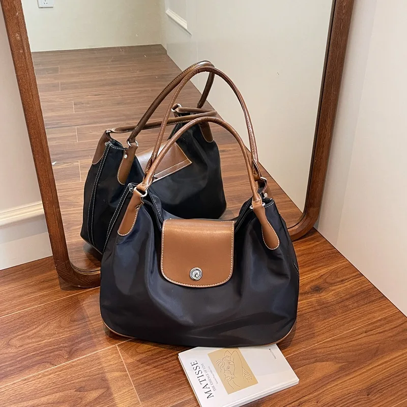 Casual Big Bag Women's 2025 New Fashion Vintage Versatile Shoulder Bag Large Capacity Commuting Toy Bag
Casual Big Bag Women's 2025 New Fashion Vintage Versatile Shoulder Bag Large Capacity Commuting Toy Bag