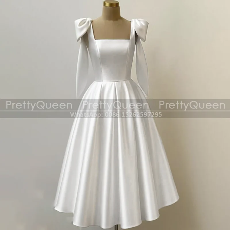 White A Line Bridesmaid Dresses Square Neck Tea Length Bows Spaghetti Straps Customized Long Wedding Party Dress
White A Line Bridesmaid Dresses Square Neck Tea Length Bows Spaghetti Straps Customized Long Wedding Party Dress