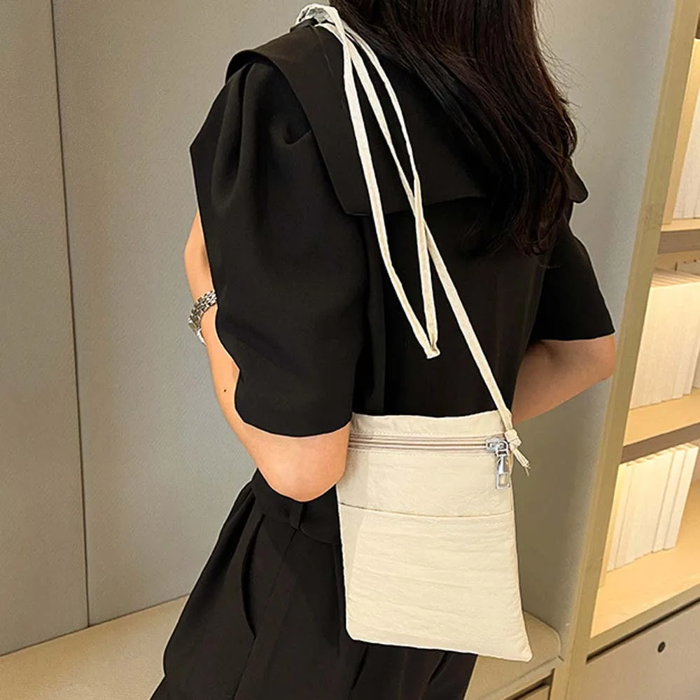 Thin Strap Solid Color Phone Purse Lightweight Solid Color Small Nylon Crossbody Bag Portable Zipper Simple Shoulder Bag Women
Thin Strap Solid Color Phone Purse Lightweight Solid Color Small Nylon Crossbody Bag Portable Zipper Simple Shoulder Bag Women