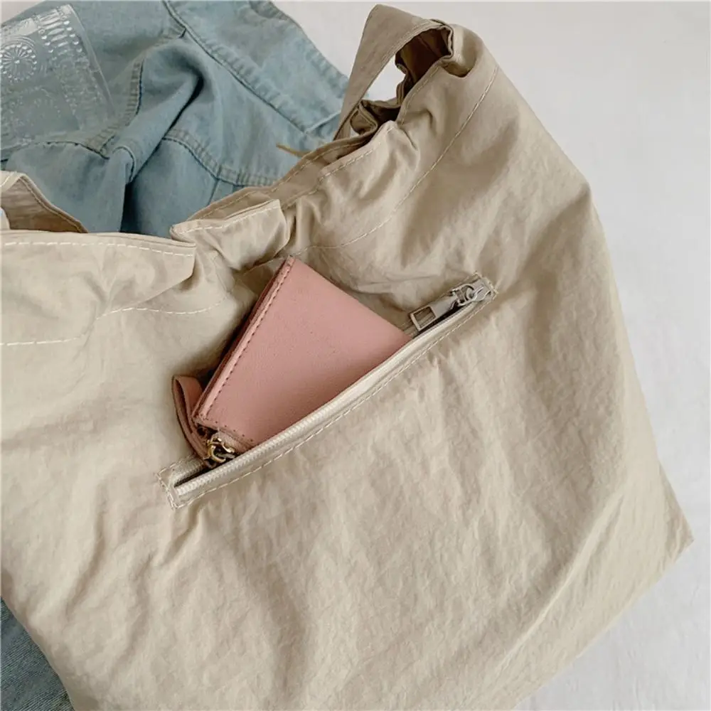 Oxford Cloth Versatile Shoulder Bag Large Capacity Lightweight Casual Crossbody Bag Korean Style Minimalist
Oxford Cloth Versatile Shoulder Bag Large Capacity Lightweight Casual Crossbody Bag Korean Style Minimalist