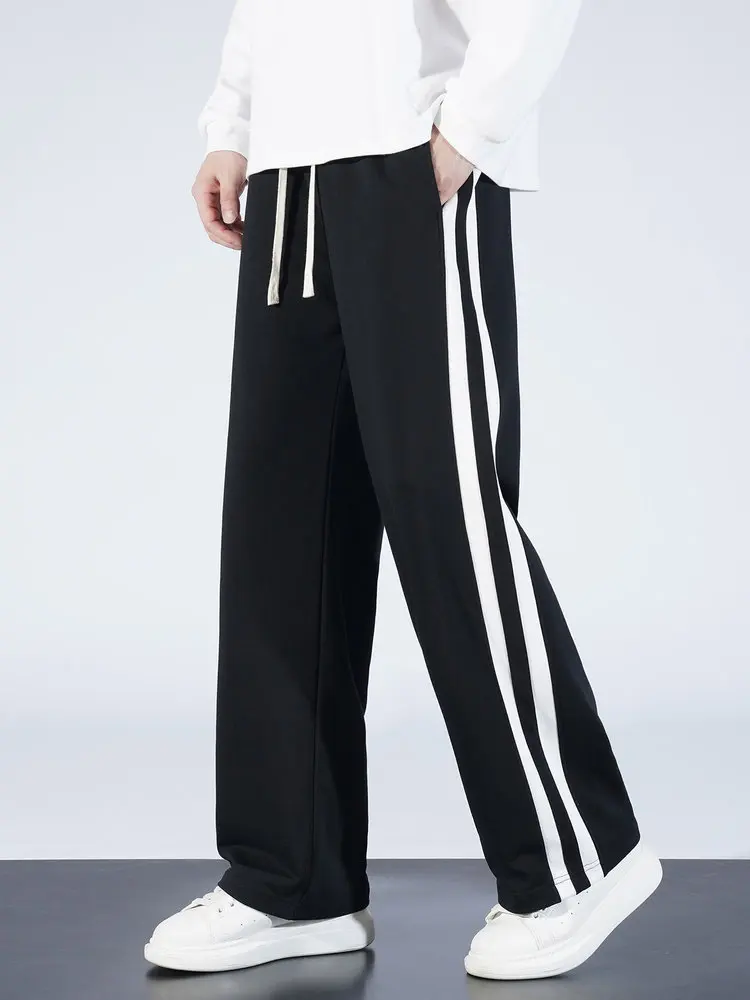 Осенние мужские повседневные спортивные штаны, удобные свободные прямые вязаные спортивные штаны, модные полосатые черные, серые студенческие брюки
Осенние мужские повседневные спортивные штаны, удобные свободные прямые вязаные спортивные штаны, модные полосатые черные, серые студенческие брюки