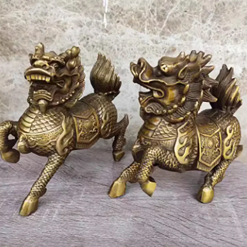 A pair of brass fire qilin home and living room handicraft ornaments for collecting antique bronze artifacts
A pair of brass fire qilin home and living room handicraft ornaments for collecting antique bronze artifacts