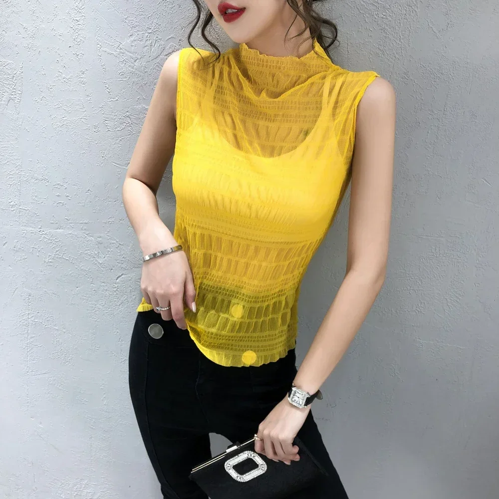 Sexy Lace T Shirt Women Stand Collar Vest Sleeveless High Neck Ruffle Collar See-through T-Shirt Tops Spring Fashion Office Top
Sexy Lace T Shirt Women Stand Collar Vest Sleeveless High Neck Ruffle Collar See-through T-Shirt Tops Spring Fashion Office Top