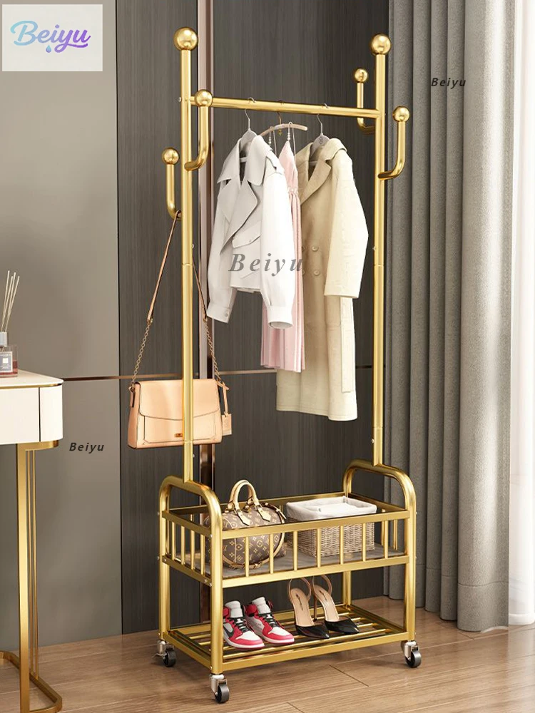 Movable bedroom floor drying rack household with wheels hanging hanger living room clothes storage rack light luxury coat rack
Movable bedroom floor drying rack household with wheels hanging hanger living room clothes storage rack light luxury coat rack