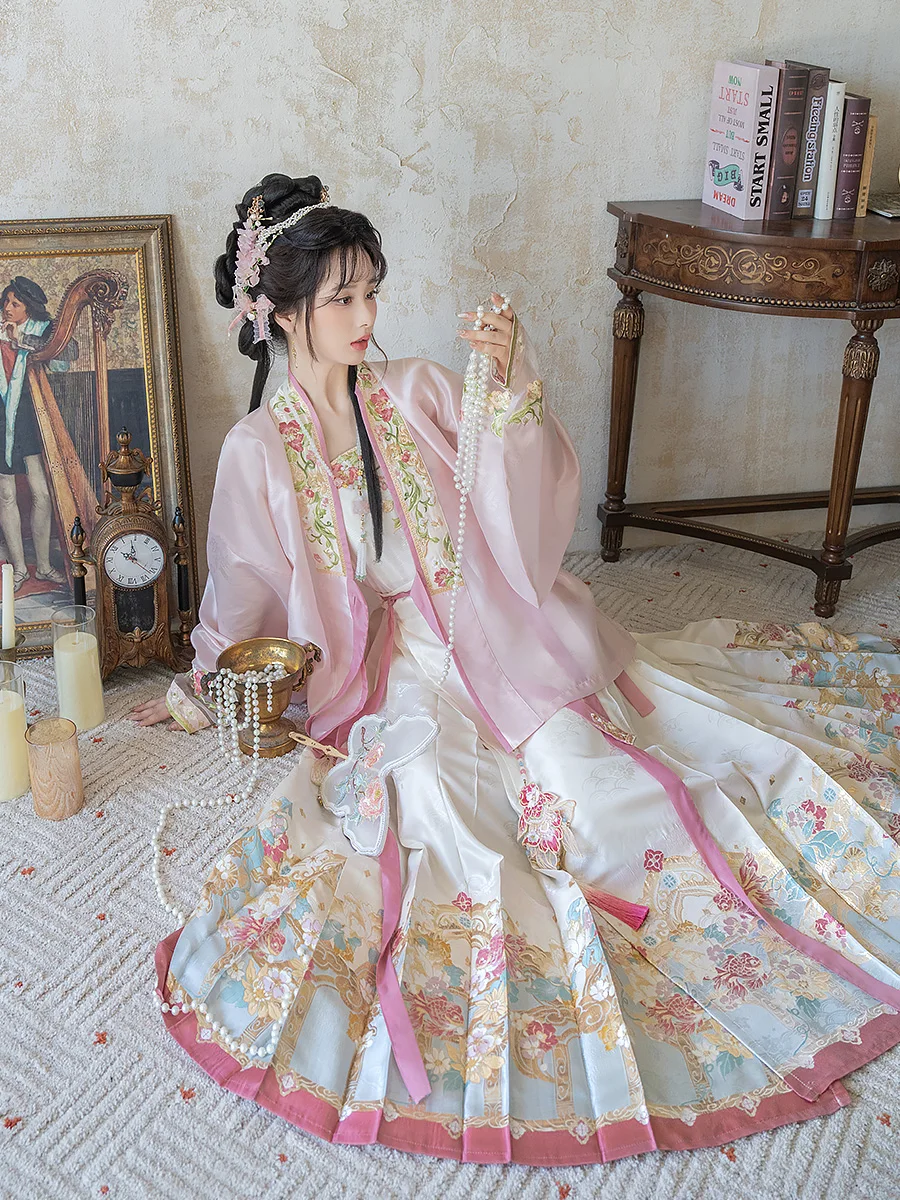 Ming Dynasty-inspired pink floral embroidered Hanfu skirt set, where exquisite craftsmanship meets vintage aesthetics.
Ming Dynasty-inspired pink floral embroidered Hanfu skirt set, where exquisite craftsmanship meets vintage aesthetics.