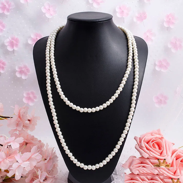 Double-layer glass pearl necklace, long style cheongsam, multi-layer chain, women's sweater chain.
Double-layer glass pearl necklace, long style cheongsam, multi-layer chain, women's sweater chain.