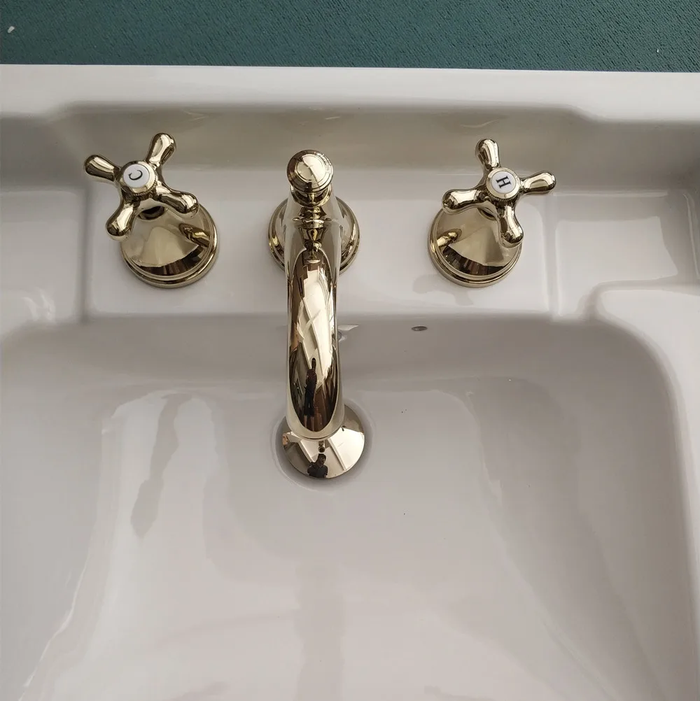 gold copper three-hole faucet, bathroom hand wash washbasin, hot and cold washbasin faucet
gold copper three-hole faucet, bathroom hand wash washbasin, hot and cold washbasin faucet