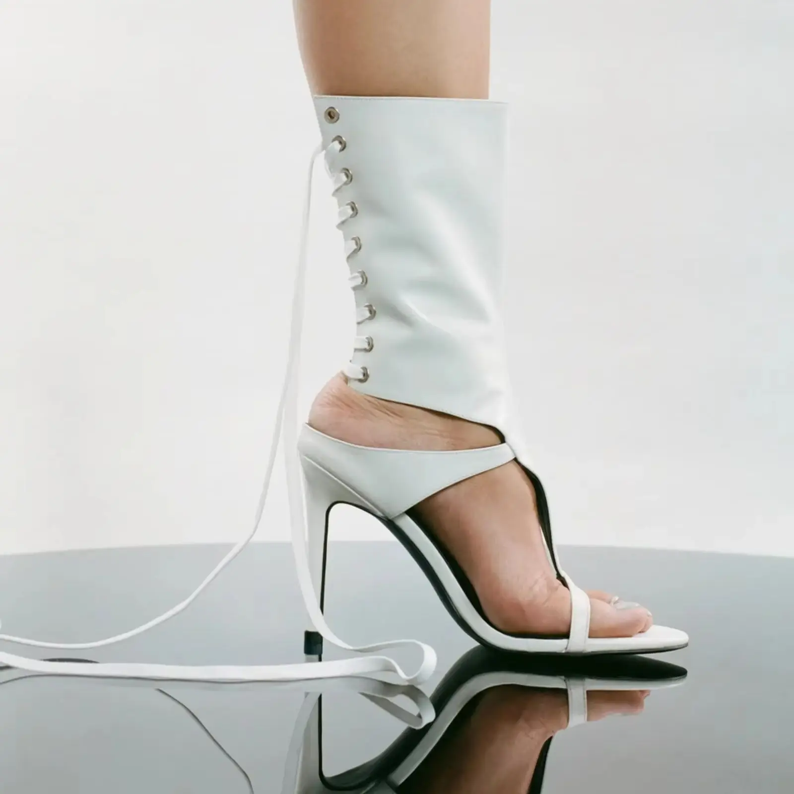 Women Black Leather Open Toe Back Lace-Up Hollow Mic-Calf Sandals Boots 2026 Fashions Stiletto Heel Sandals Summer Party Catwalk
Women Black Leather Open Toe Back Lace-Up Hollow Mic-Calf Sandals Boots 2026 Fashions Stiletto Heel Sandals Summer Party Catwalk