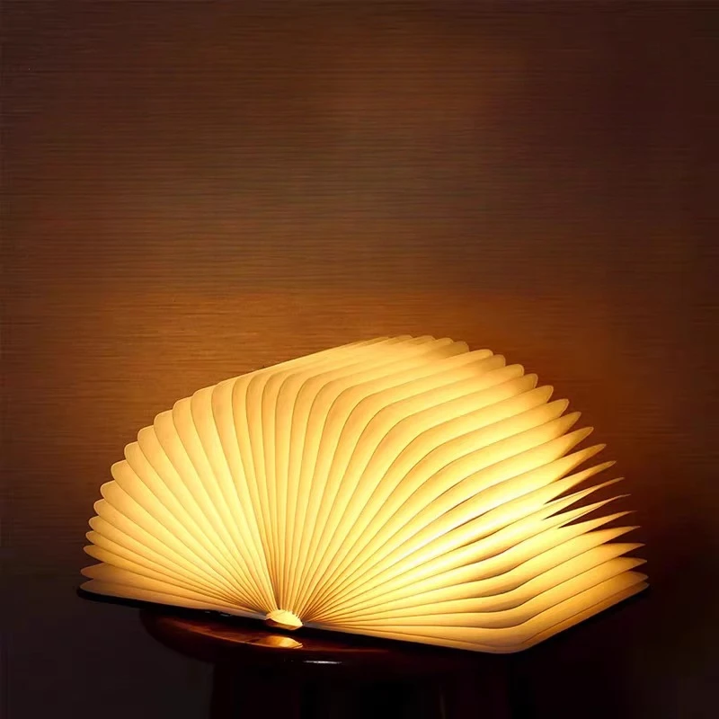 Book lamp will shine book lamp, creative folding desk lamp turning book page night lamp
Book lamp will shine book lamp, creative folding desk lamp turning book page night lamp
