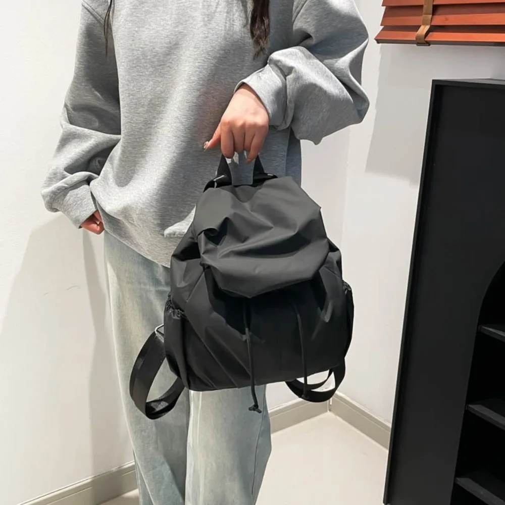 Casual Solid Color Drawstring Backpack Flap Pleated Nylon Backpack Large Capacity Multi Functional Sports Shoulders Bag Outdoor
Casual Solid Color Drawstring Backpack Flap Pleated Nylon Backpack Large Capacity Multi Functional Sports Shoulders Bag Outdoor