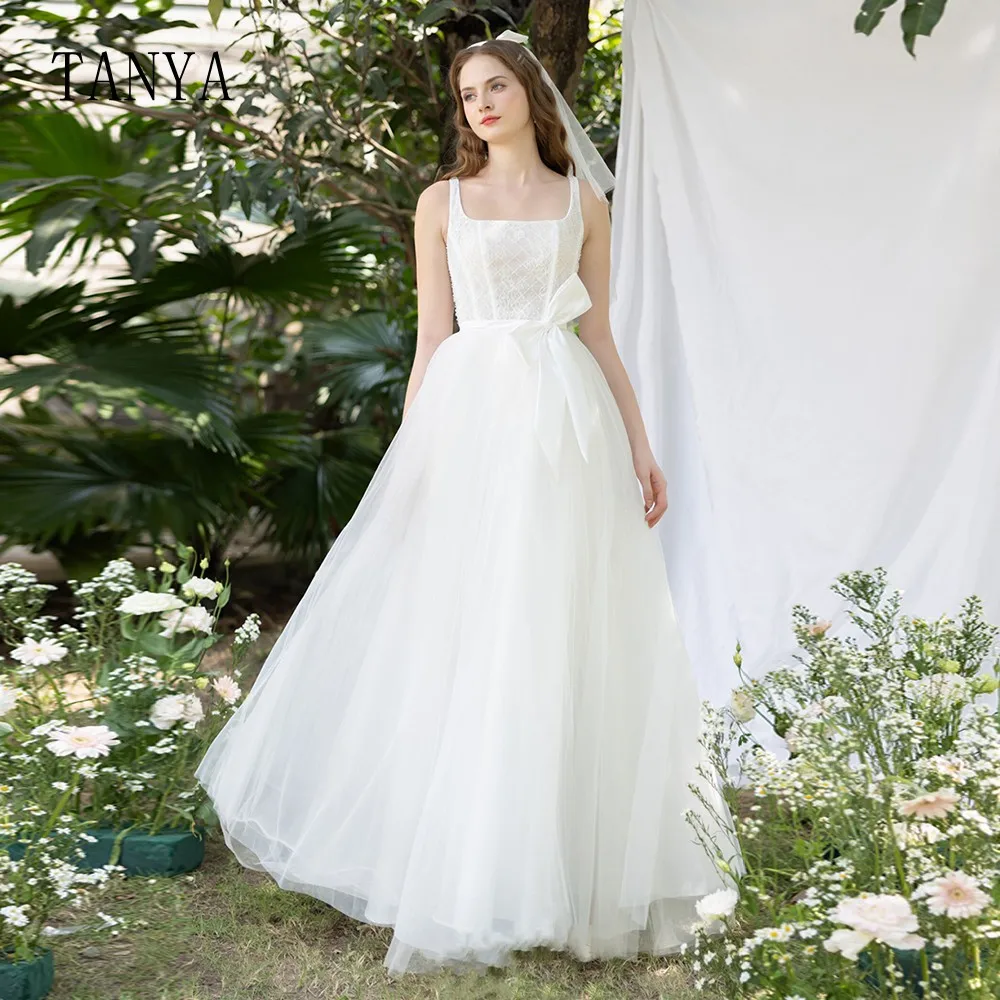 Square Collar Soft Tulle Wedding Dresses A Line Sleeveless Floor Length Bridal Party Dress Sexy Backless Zipper Bridal Gown
Square Collar Soft Tulle Wedding Dresses A Line Sleeveless Floor Length Bridal Party Dress Sexy Backless Zipper Bridal Gown