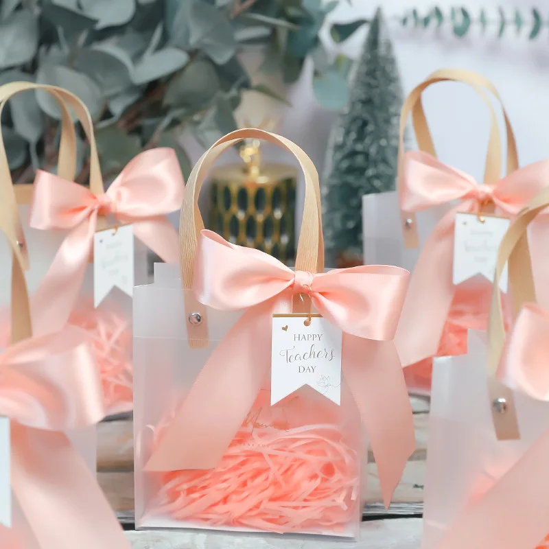 5/10pcs Pvc Gift Bag Souvenir Tote Bag Bow Ribbon Wedding Favors For Guests Transparent Candy Boxes Party Distributions Bags
5/10pcs Pvc Gift Bag Souvenir Tote Bag Bow Ribbon Wedding Favors For Guests Transparent Candy Boxes Party Distributions Bags
