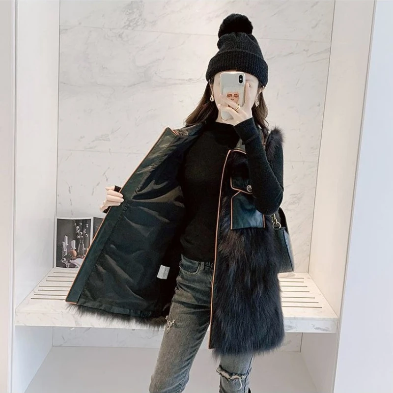 2025 Winter New Women's Faux Fur Vest Thickened Mid Length Outerwear Slimming Youthful Style with Cool Sweet Aesthetic
2025 Winter New Women's Faux Fur Vest Thickened Mid Length Outerwear Slimming Youthful Style with Cool Sweet Aesthetic
