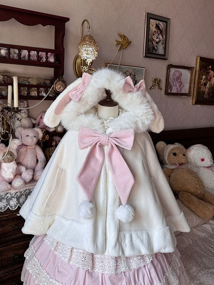 Japanese Sweet Lolita Cute Hooded Cloak Women Fashion Bow Kawaii Warm Capes Coat Harajuku Thick Clothing Sweet Autumn Outerwear
Japanese Sweet Lolita Cute Hooded Cloak Women Fashion Bow Kawaii Warm Capes Coat Harajuku Thick Clothing Sweet Autumn Outerwear