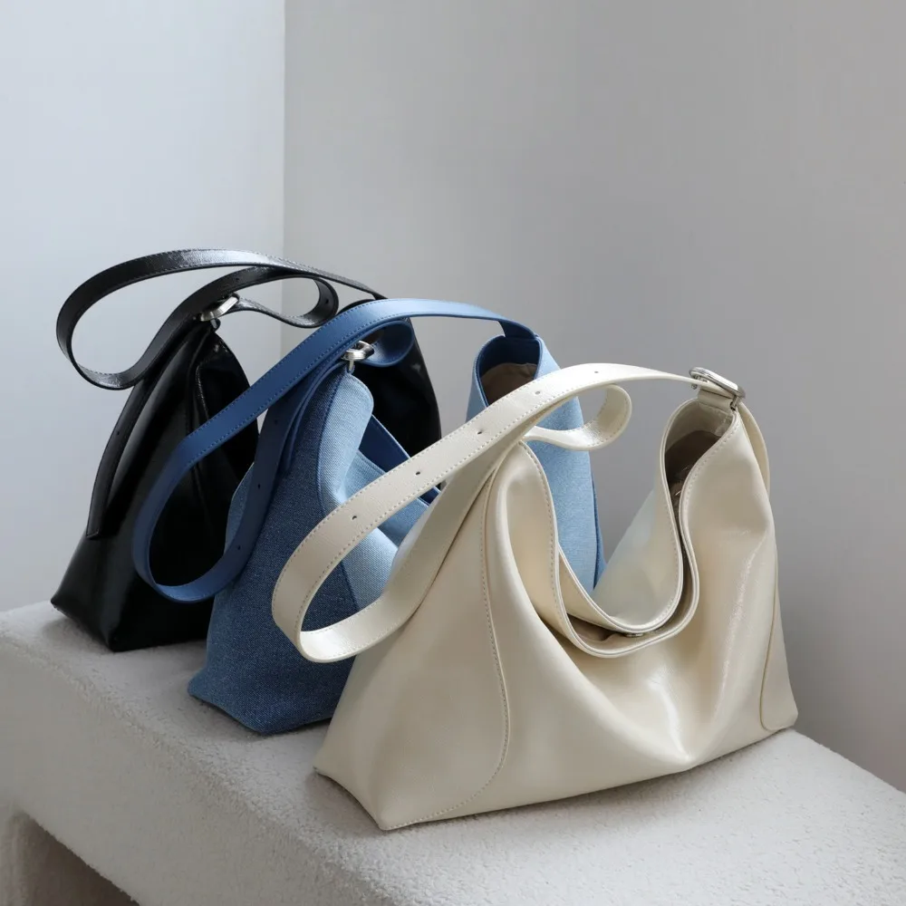 Niche High-end Simple Denim Bag Large-capacity Tote Bag Lazy Style Versatile Single Shoulder Crossbody Leather Women's Fashion
Niche High-end Simple Denim Bag Large-capacity Tote Bag Lazy Style Versatile Single Shoulder Crossbody Leather Women's Fashion