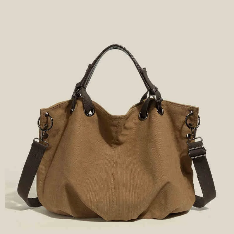 Новая сумка для спецодежды в стиле ретро, модная брендовая холщовая сумка, многофункциональная сумка через плечо большой вместимости.
Новая сумка для спецодежды в стиле ретро, модная брендовая холщовая сумка, многофункциональная сумка через плечо большой вместимости.