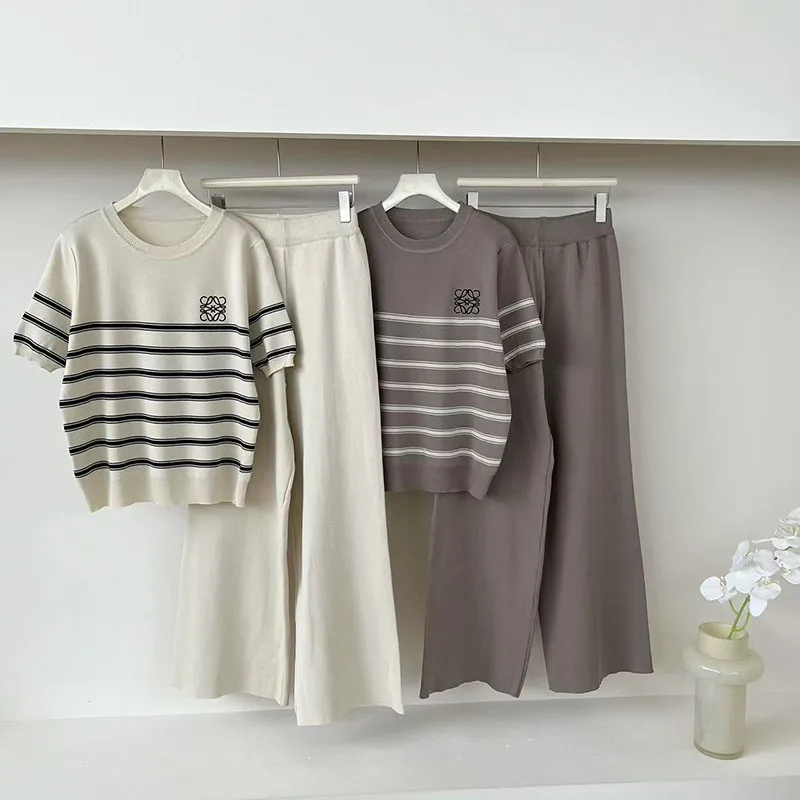 Spring and summer new simple striped loose short sleeved knitted top comfortable wide leg pants two-piece set for women
Spring and summer new simple striped loose short sleeved knitted top comfortable wide leg pants two-piece set for women