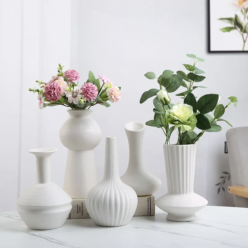 Nordic home decoration ceramic vase dry flower vase home simple creative decoration white living room
Nordic home decoration ceramic vase dry flower vase home simple creative decoration white living room