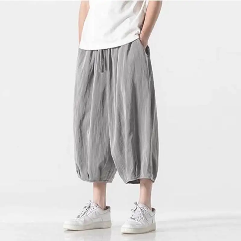 Летние мужские свободные брюки-фонарики с широкими штанинами, повседневные, в стиле Харадзюку, со средней низкой посадкой, длиной до щиколотки, прохладные, трендовые
Летние мужские свободные брюки-фонарики с широкими штанинами, повседневные, в стиле Харадзюку, со средней низкой посадкой, длиной до щиколотки, прохладные, трендовые