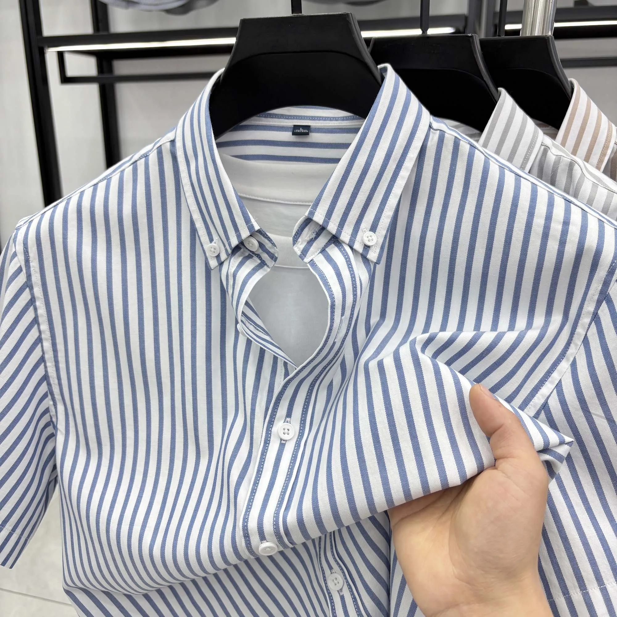Summer New Men's Striped Shirt, No Ironing Short Sleeved T-shirt, Casual, Loose, Versatile, Breathable and Versatile Shirt
Summer New Men's Striped Shirt, No Ironing Short Sleeved T-shirt, Casual, Loose, Versatile, Breathable and Versatile Shirt