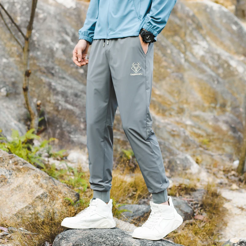 Summer Lightweight Men's Casual Pants Breathable Cool Feeling Stretch Fashion Embroidery Outdoor Ankle-Tied Sports Ninth Pants
Summer Lightweight Men's Casual Pants Breathable Cool Feeling Stretch Fashion Embroidery Outdoor Ankle-Tied Sports Ninth Pants