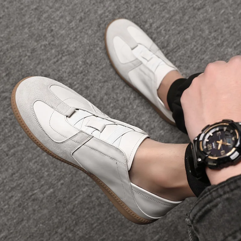 Новые мужские повседневные туфли из натуральной кожи, модные плоские кеды, молодежные уличные кроссовки без шнурков
Новые мужские повседневные туфли из натуральной кожи, модные плоские кеды, молодежные уличные кроссовки без шнурков