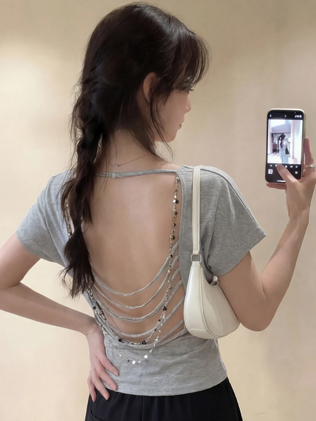 Chic Backless Short Sleeve T-Shirt Women's Summer New Sexy Chain Design Top Breathable Loose Fit Pure Color Fashionable
Chic Backless Short Sleeve T-Shirt Women's Summer New Sexy Chain Design Top Breathable Loose Fit Pure Color Fashionable