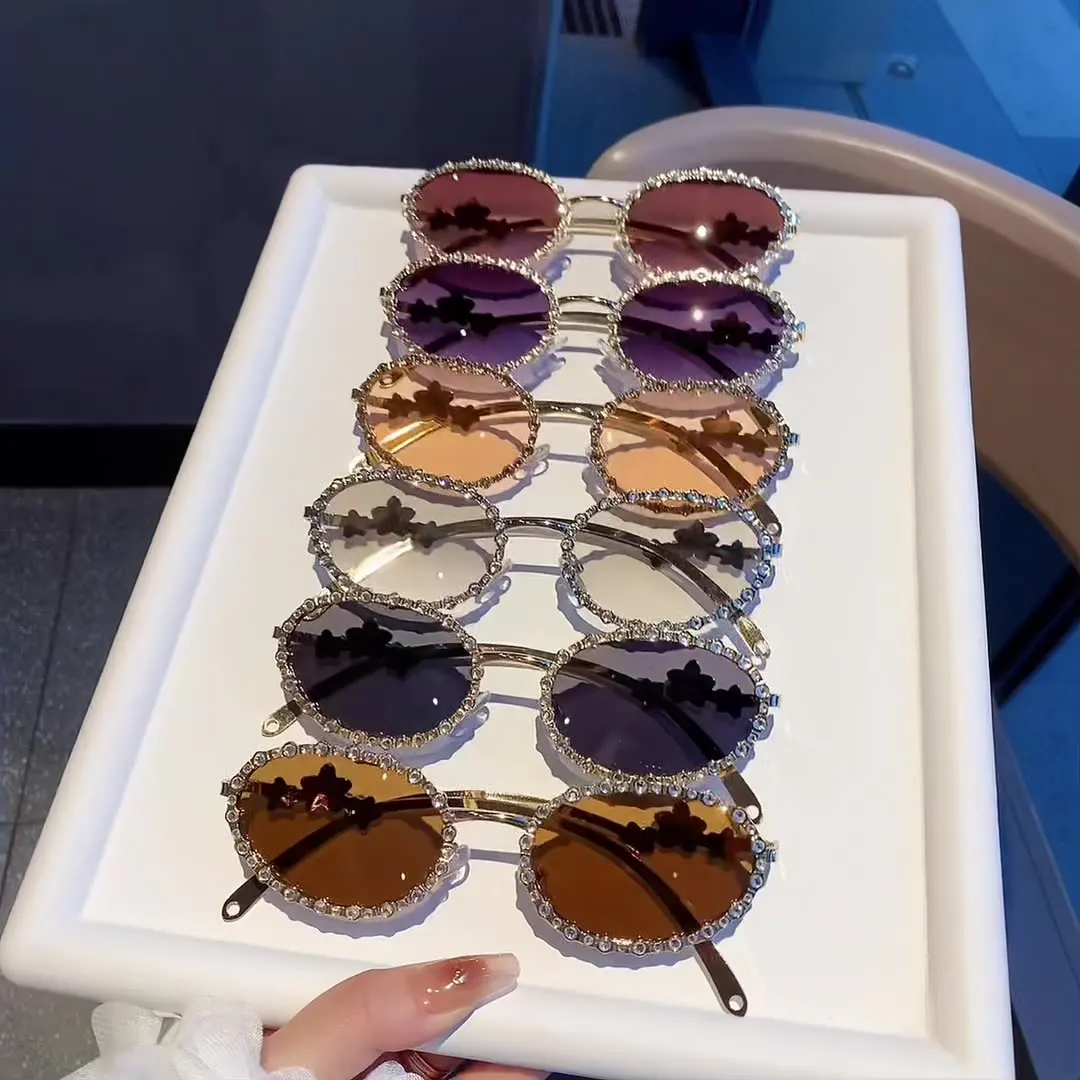 New Fashionable Metal Diamond Sunglasses for Women, Trendy and Premium, Water Diamond Small Frame Sunglasses 
New Fashionable Metal Diamond Sunglasses for Women, Trendy and Premium, Water Diamond Small Frame Sunglasses