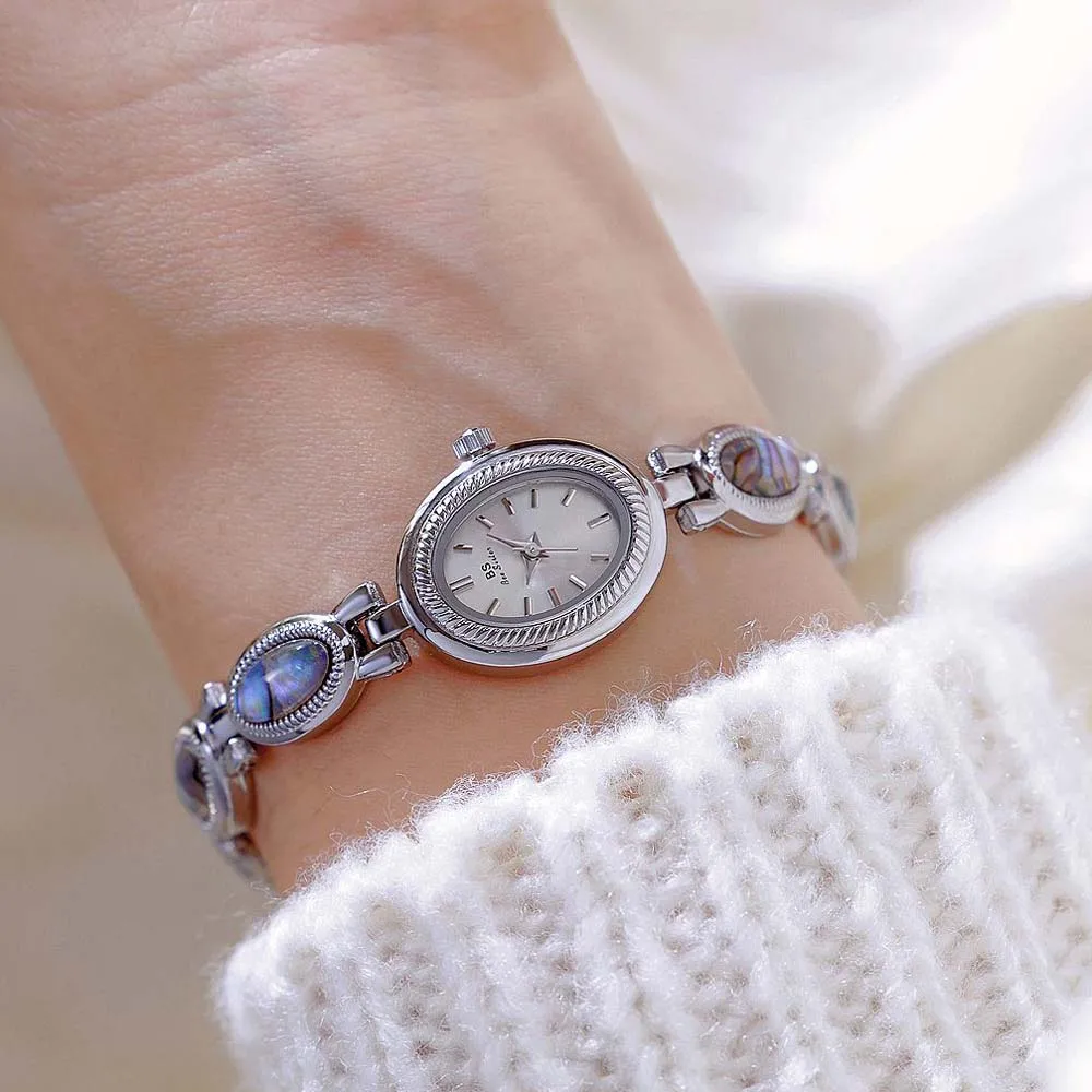 Women's Wrist Watch Colorful Natural shells Bracelet Vintage Watch Small Oval Dial Gold Retro Watches Luxury Quartz Clock Gifts
Women's Wrist Watch Colorful Natural shells Bracelet Vintage Watch Small Oval Dial Gold Retro Watches Luxury Quartz Clock Gifts