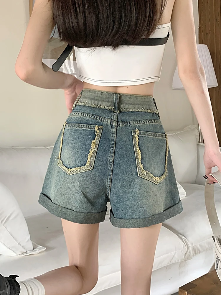 Джинсовые шорты с высокой талией, А-силуэт, женские, летние, утягивающие, с широкими штанинами, винтажные, с эффектом рулонных штанин, из смесового хлопка, немнущиеся
Джинсовые шорты с высокой талией, А-силуэт, женские, летние, утягивающие, с широкими штанинами, винтажные, с эффектом рулонных штанин, из смесового хлопка, немнущиеся