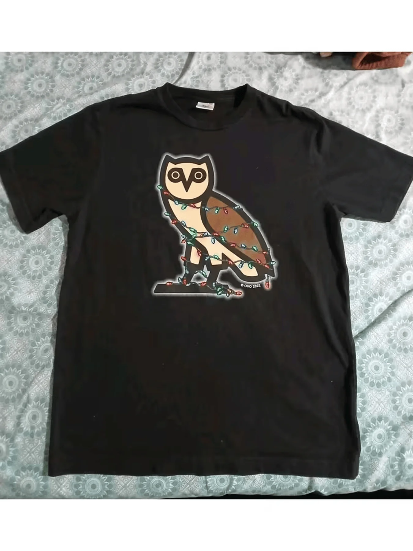 Festive Cartoon Owl T-Shirt - Black Graphic Tee Featuring Adorable Owl with Christmas Lights | Perfect Holiday Apparel
Festive Cartoon Owl T-Shirt - Black Graphic Tee Featuring Adorable Owl with Christmas Lights | Perfect Holiday Apparel