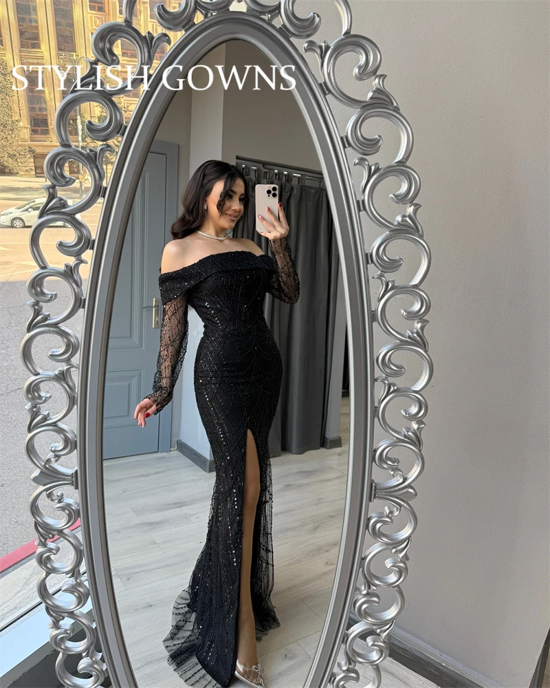 Saudi Arabia Luxury Black Off Shoulder Evening Dress Shiny Fabric Long Sleeves Bead Prom Dresses 2025 Slit Special Customized
Saudi Arabia Luxury Black Off Shoulder Evening Dress Shiny Fabric Long Sleeves Bead Prom Dresses 2025 Slit Special Customized 