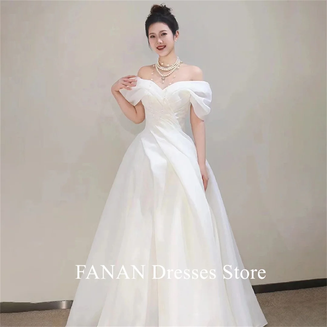 FANAN Off the Shoulder Korea Ivory Short Sleeves Organza Wedding Dresses 웨딩드레스 Custom Made A-Line Corset Bride Gowns Plus Size
FANAN Off the Shoulder Korea Ivory Short Sleeves Organza Wedding Dresses 웨딩드레스 Custom Made A-Line Corset Bride Gowns Plus Size