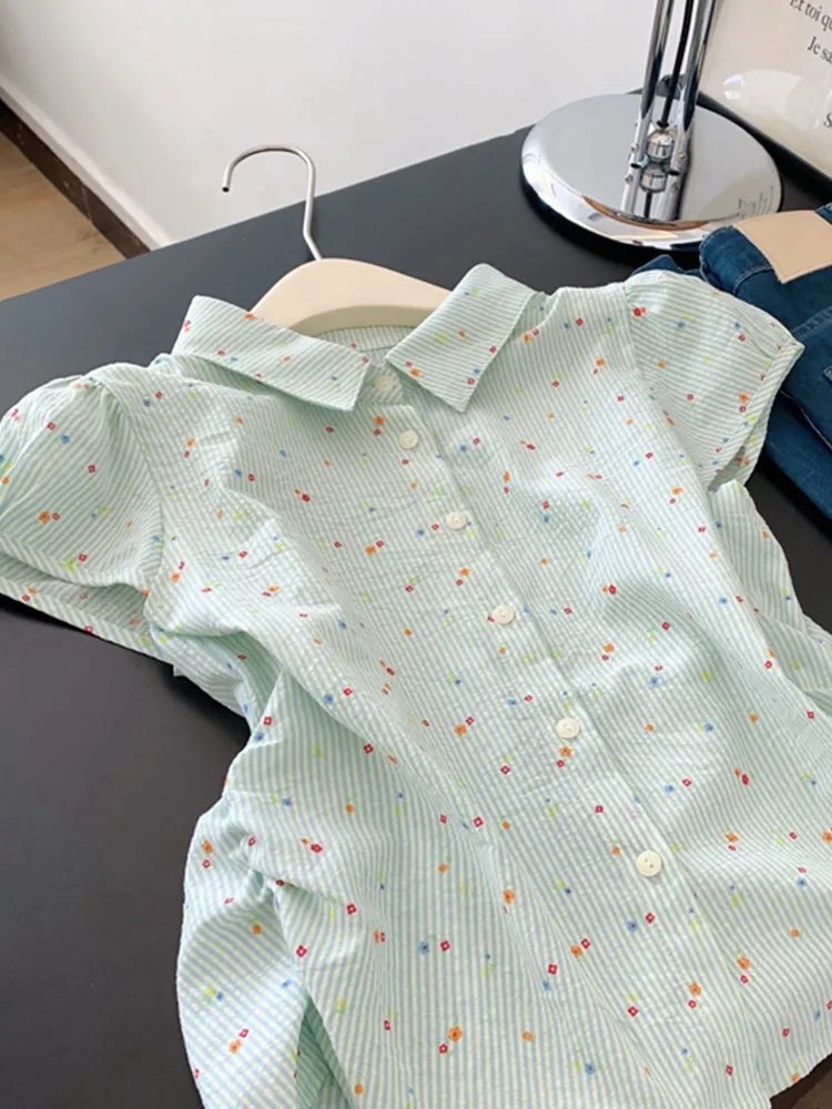 Шикарная милая летняя корейская рубашка с кукольным воротником в полоску с цветочным принтом для девочек, маленькая рубашка с летящими рукавами для женщин, новый французский элегантный универсальный топ
Шикарная милая летняя корейская рубашка с кукольным воротником в полоску с цветочным принтом для девочек, маленькая рубашка с летящими рукавами для женщин, новый французский элегантный универсальный топ